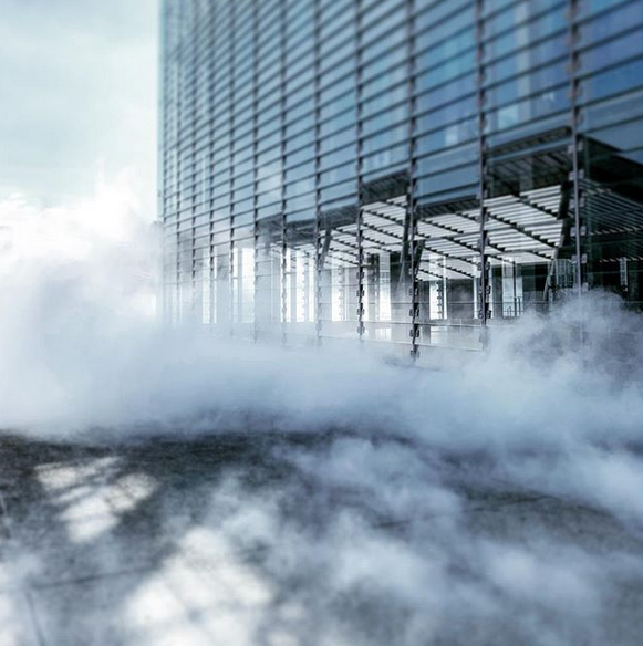 喷雾除尘系统对空ω　气颗粒污染物的作用